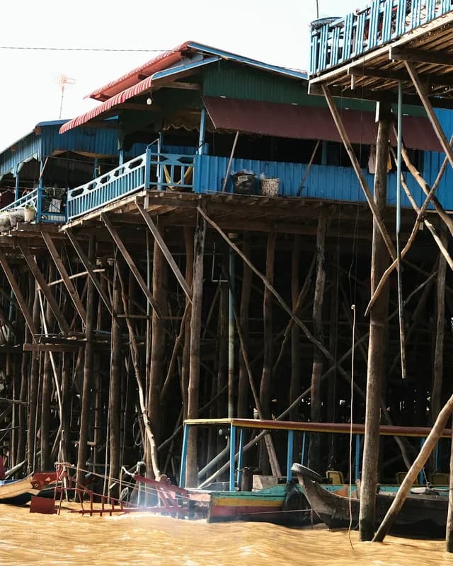 Wooden houses on tall stilts above the water, near Siem Reap